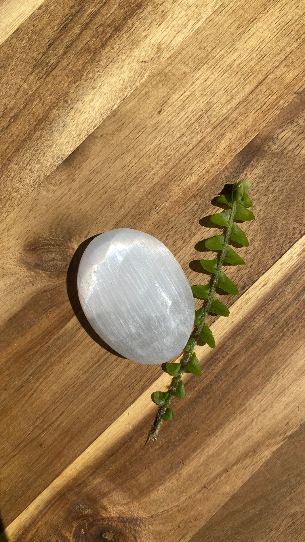 Selenite palm stone